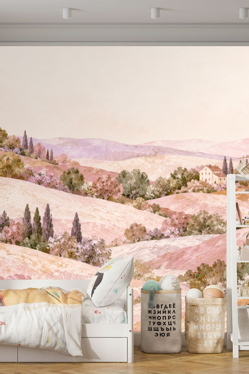 Bedroom with gray bed and bedside tables featuring wallpaper of rolling pastel hills and cypress trees