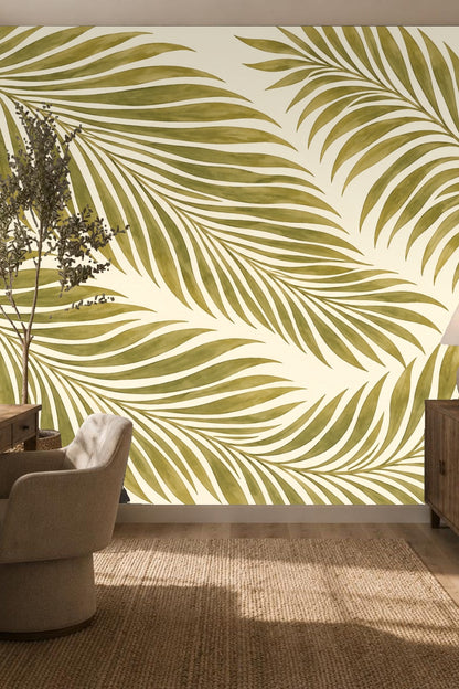 Nursery corner with rocking chair and Olive Frond Cascade wallpaper in soft olive green tones