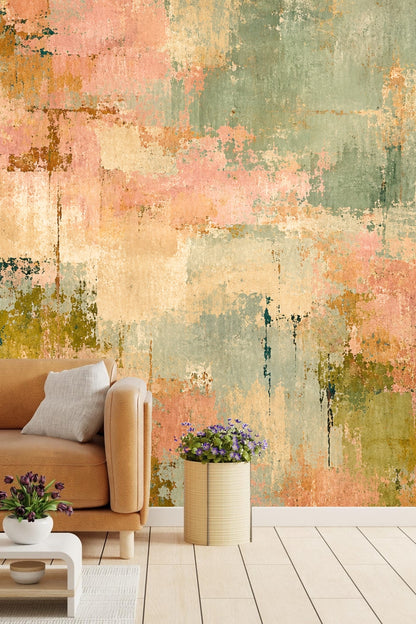 Bedroom interior featuring abstract terrain mural wallpaper behind a gray bed and white lamp