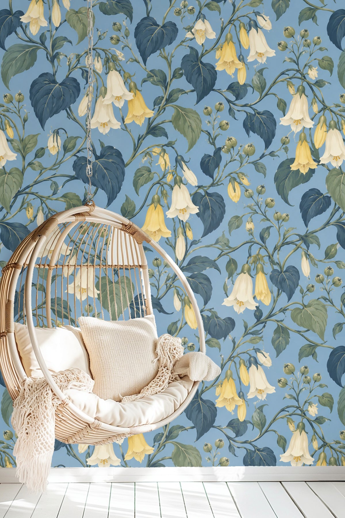 Close-up of bellflower patterned wallpaper with yellow and cream blossoms on blue background