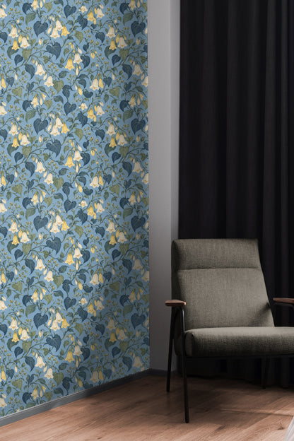 Intertwining stems and small buds with blue and green leaves on floral wallpaper