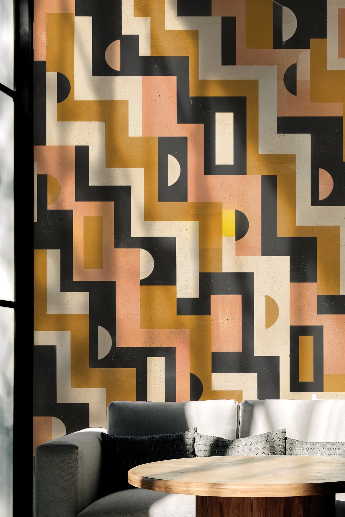 Photo of hand peeling a section of Mid-Century Mod Geometry wallpaper showing paper texture and layered colors