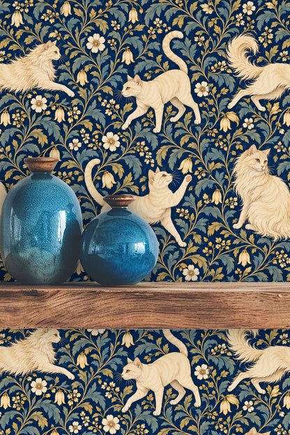 Texture detail of blue petals and golden flowers behind sitting cat