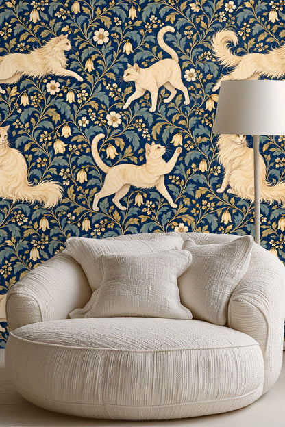 Detailed view of cream-colored cats and floral motifs on dark blue wallpaper