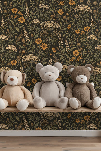 Soft cluster of cream flowers and green foliage on black wallpaper