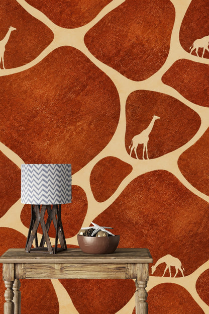 Bedroom with terracotta giraffe motif wallpaper behind light wood furniture