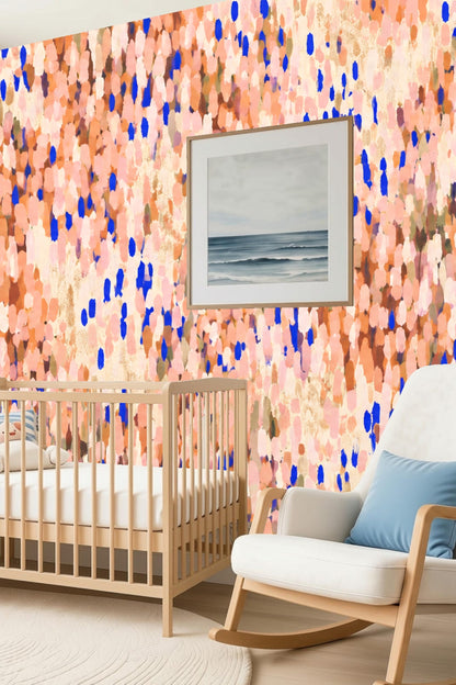 Creative workspace wall featuring dynamic coral and blue painterly wallpaper