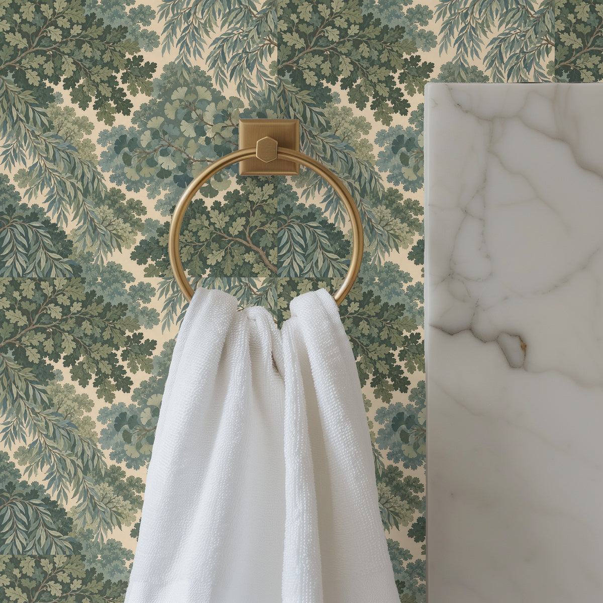 Bathroom detail showing the wallpaper next to a marble surface and a brass towel ring with a white towel