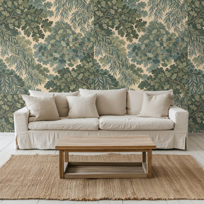 Close-up of wallpaper artwork showing layered oak, ginkgo and willow leaves on a warm cream background