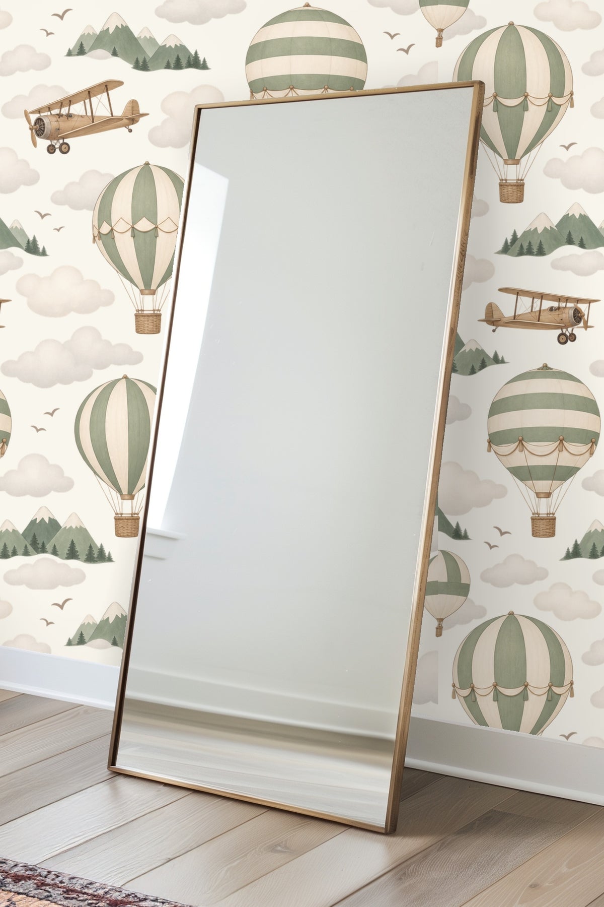 Pattern repeat showing vintage hot air balloons and sepia biplanes flying over stylized mountain ranges and clouds.