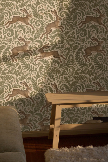 Fern leaves curling around white bell-shaped flowers in wallpaper design