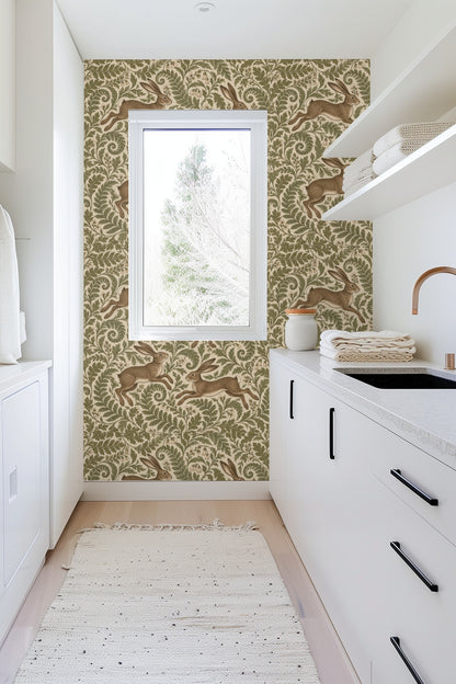 Bedroom interior with wooden furniture and wallpaper of bounding hares among green foliage