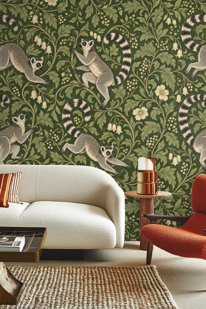 Close-up of lemur face and striped tail on green botanically patterned wallpaper
