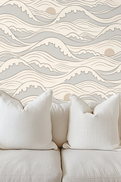 Seamless wallpaper pattern of stylized ocean waves in beige, grey, and off-white with sun motifs