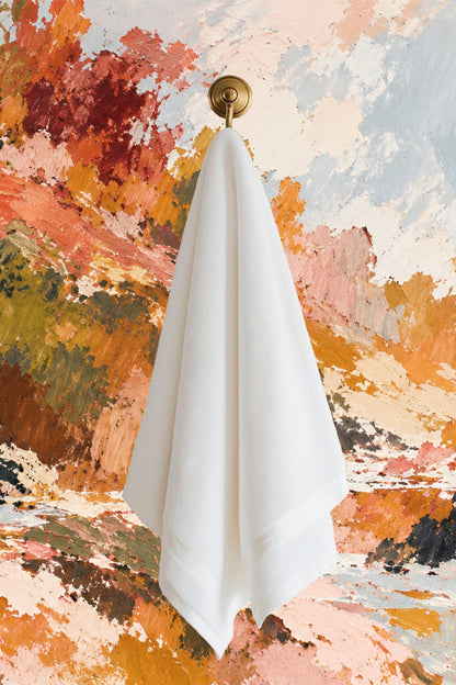 Contemporary room featuring painterly wallpaper and minimal decor