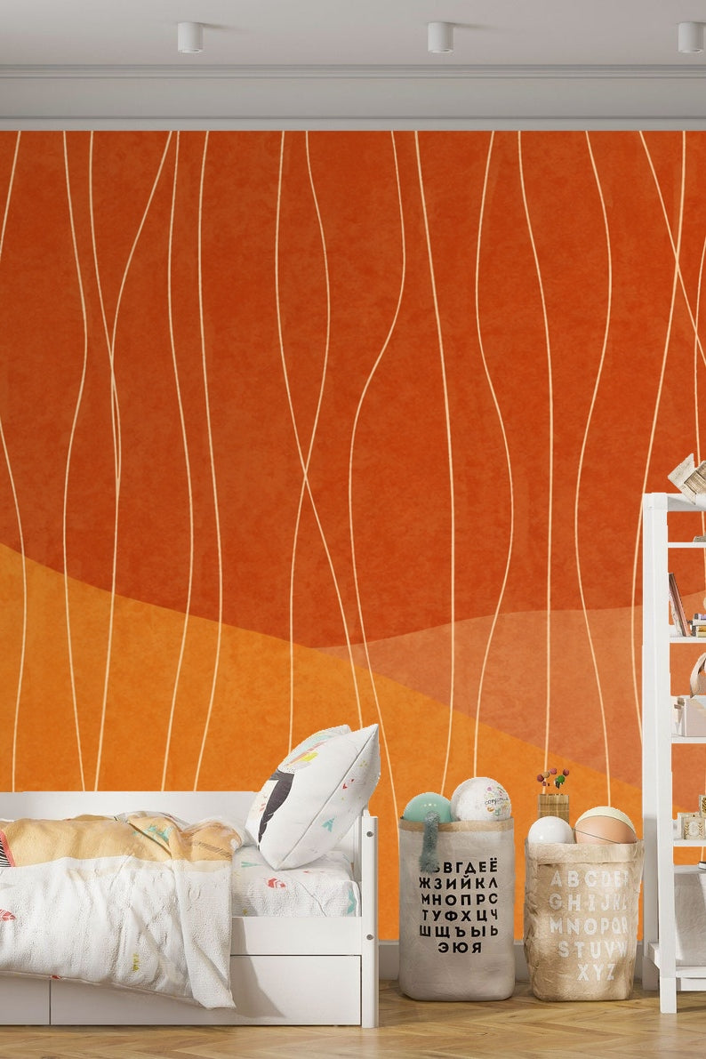 Close-up of wallpaper showing warm layered earth tones and thin flowing white lines