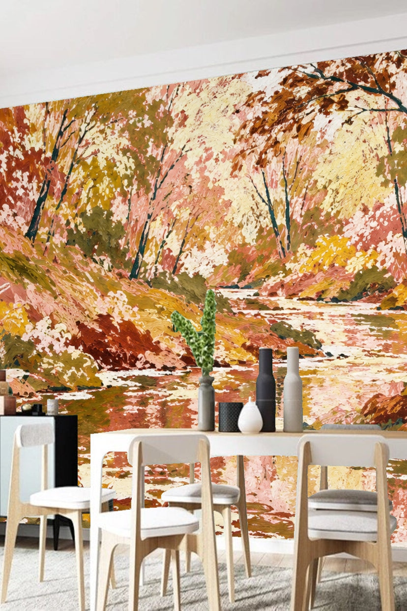 Tall thin tree trunks leaning over the reflective water in soft blush and muted yellow forest background