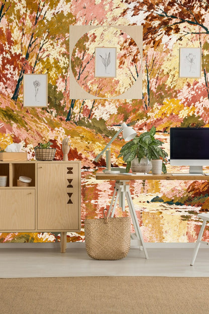 Living room wall adorned with the impressionist stream wallpaper in soft apricot, gold, and green tones behind a white sofa and pendant lamp