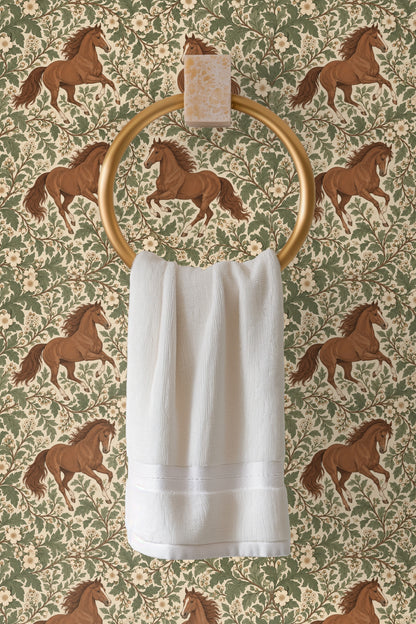 Side view of wallpaper pattern showing horses in motion amid vintage botanical scroll