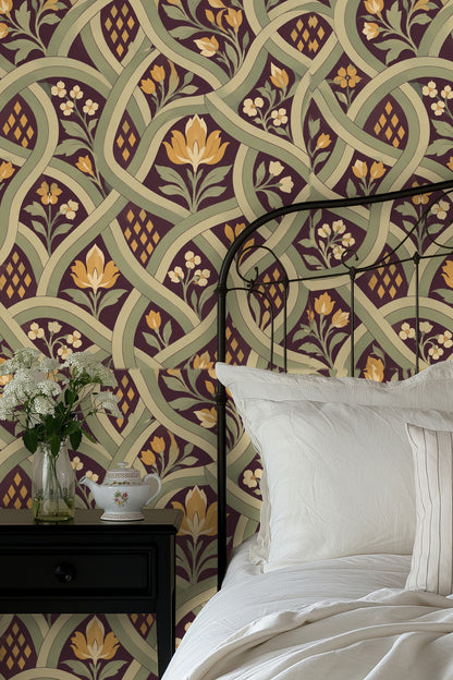 Close-up on interlocking bands overlaying stylized leaf and flower designs