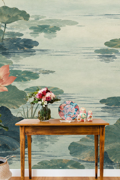 Room view featuring wall segment with large lotus seed pods among flowers and leaves.