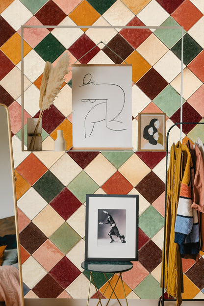 Pastel green tiles among rich terracotta hues