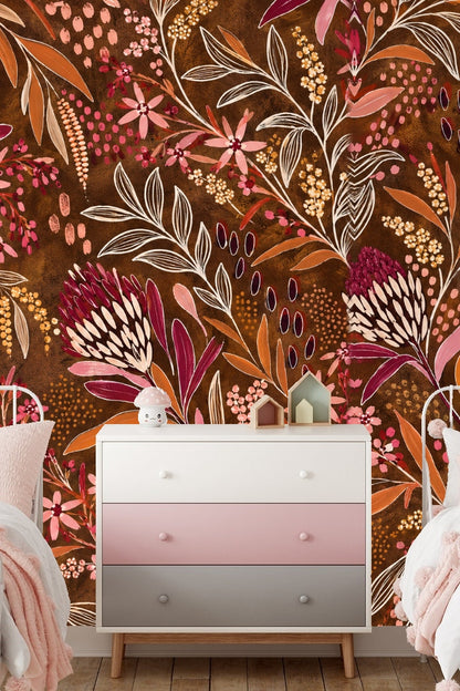 Living room feature with cerise thicket wallpaper behind oak dresser and round mirror