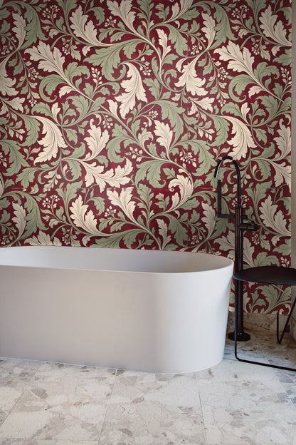 Room corner featuring warm red wallpaper with classic baroque styled foliage