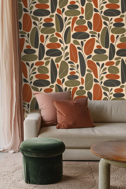 Retro leaf wallpaper in cozy bedroom with woven headboard and white bedding.