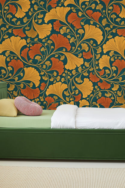 Rust and ochre ginkgo leaves swirling across teal wall