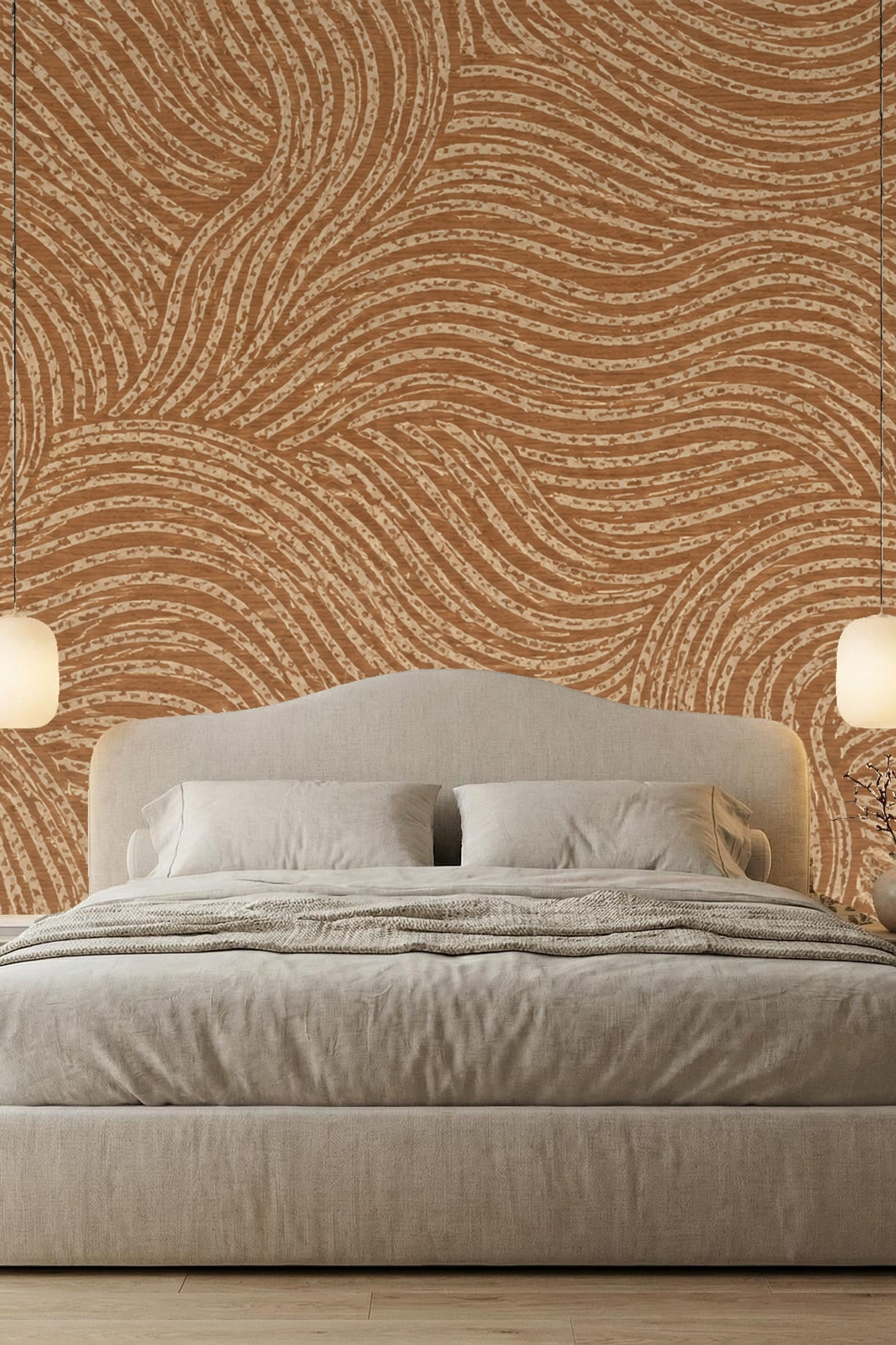Room corner showing continuous curved line pattern wallpaper in natural terracotta.