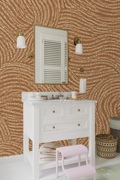 Partial view of wallpaper pattern showing overlapping curved lines in warm earth tones.