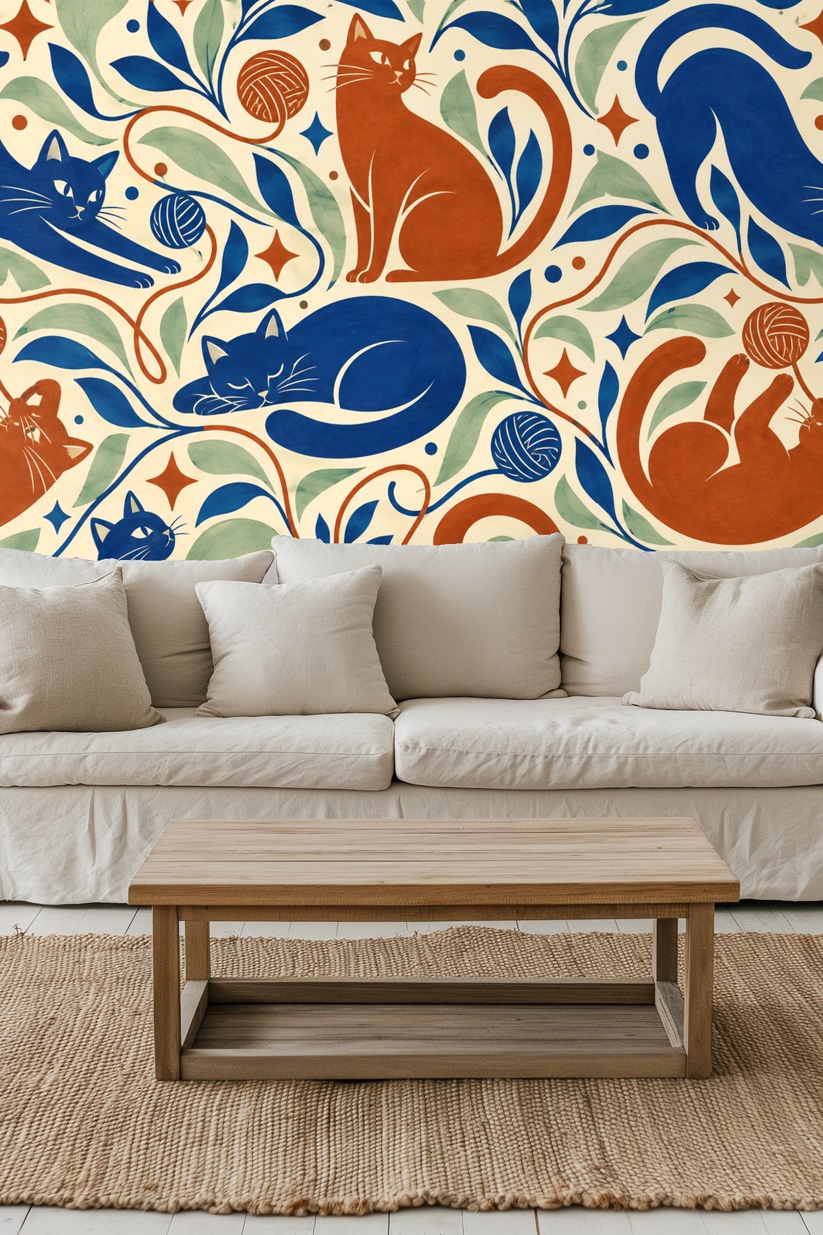 Original wallpaper artwork with terracotta and cobalt cats playing with yarn among leaves and stars on cream background.