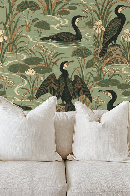 Close-up of a modern bedside with lamp and grey upholstered bed against cormorant pond wallpaper