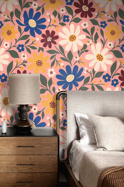 Side view of floral wallpaper showing the layered arrangement of flowers and leaves across a pink background