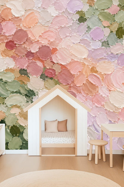 Wide shot of a bedroom with the pastel petal palette wallpaper as a focal point