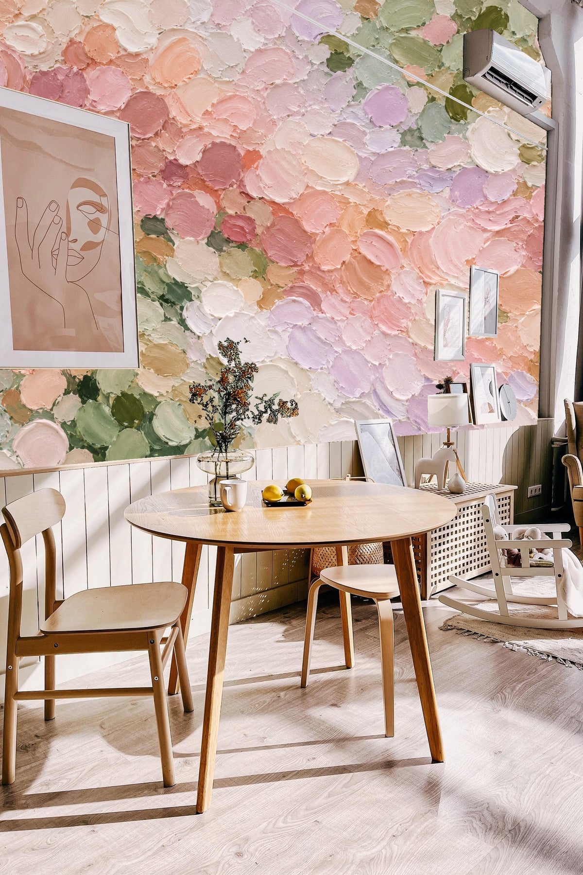 Soft light falling on wallpaper emphasizes its painterly pastel color clusters