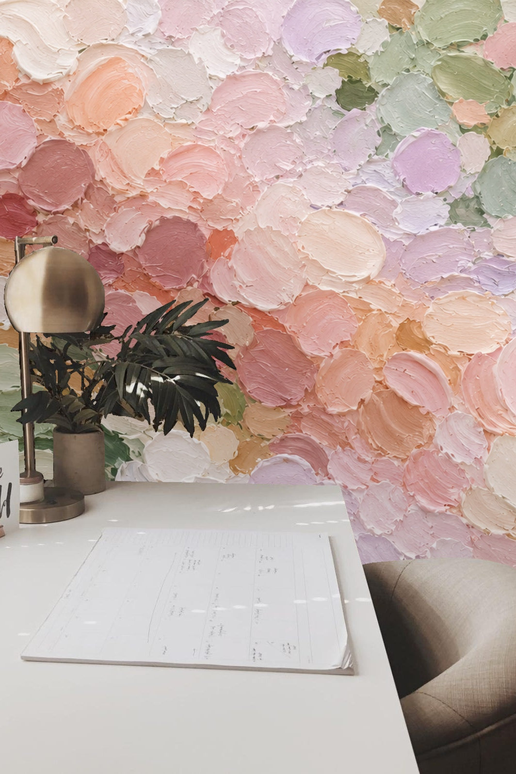 Detailed view of layered pastel peach, pink, lavender, and green brushstroke circles