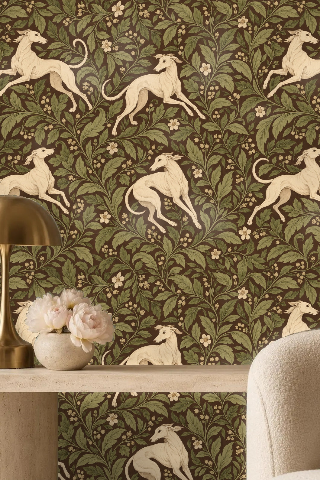 Laundry room with wallpaper of cream whippets and green leafy scroll on brown wall behind countertop and washer/dryer