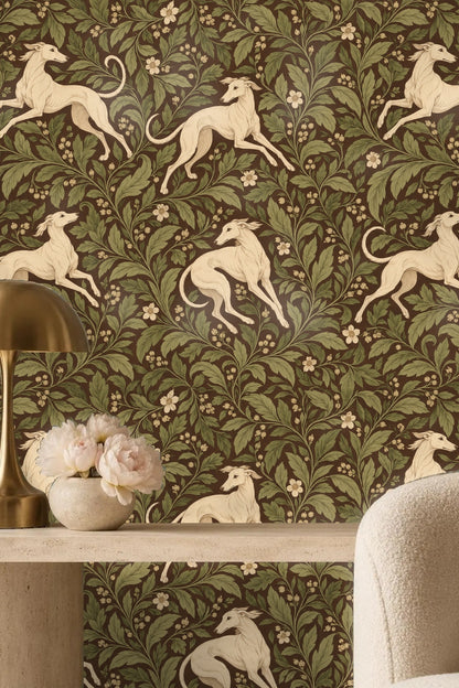 Laundry room with wallpaper of cream whippets and green leafy scroll on brown wall behind countertop and washer/dryer