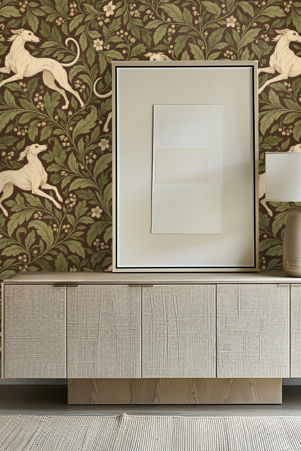Entryway featuring Whippet Scroll wallpaper behind light wood credenza and framed abstract art