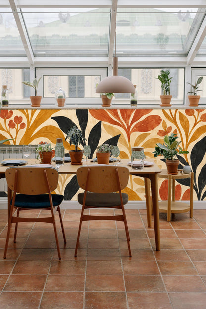 Section of the wallpaper showing black leaves providing contrast to warm earthy tones