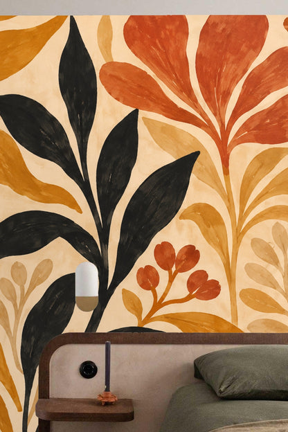 Cozy reading nook with cream chair by botanical wallpaper in warm color palette