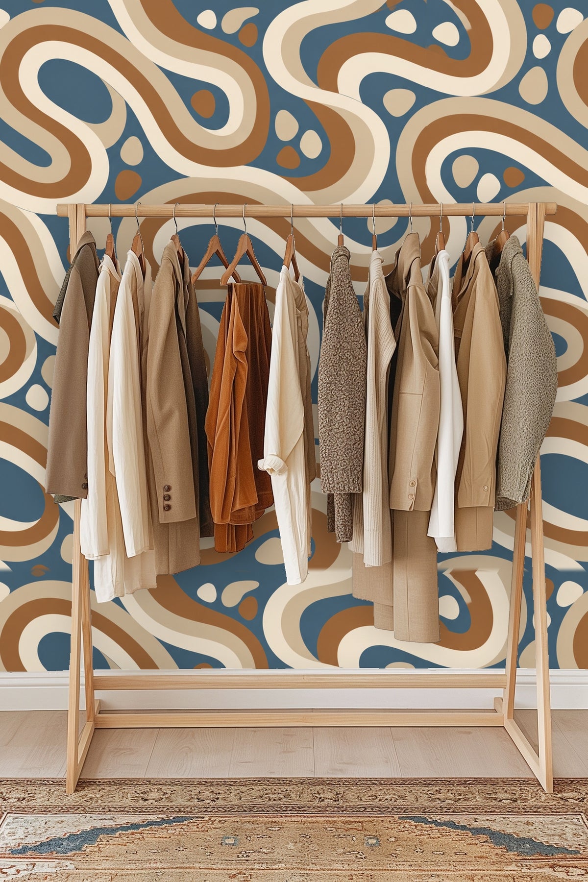 Segment of wallpaper showing cream and brown looping shapes with small dots