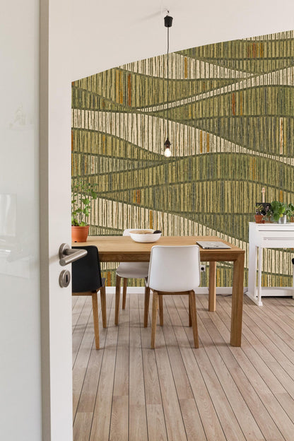 Close-up of wallpaper's rust accents among olive and beige lines