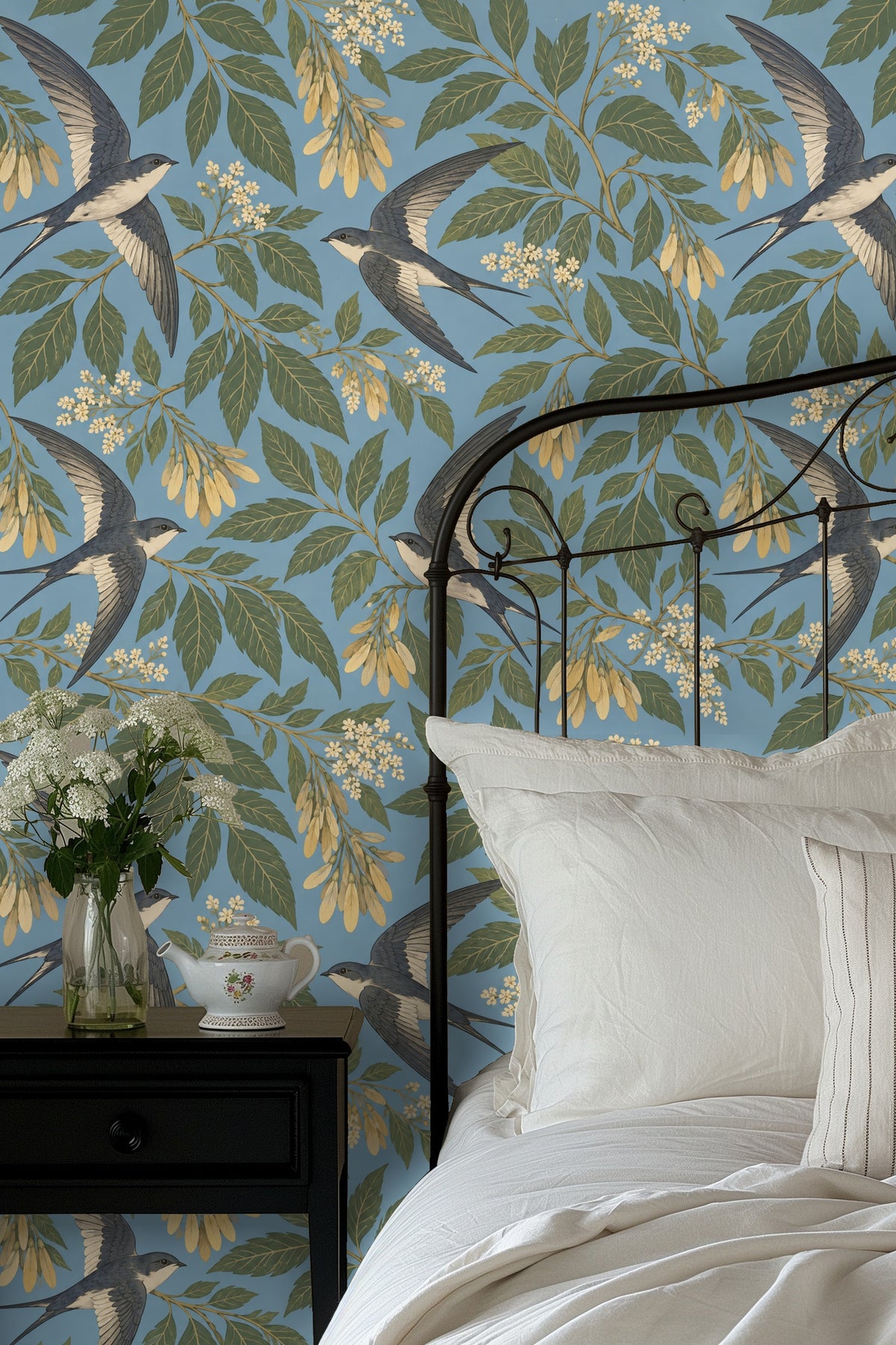Delicate cream and yellow floral clusters interspersed with green foliage