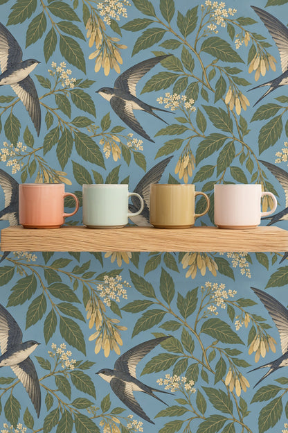 Swallow's white underside contrasted with blue-gray wings in wallpaper art