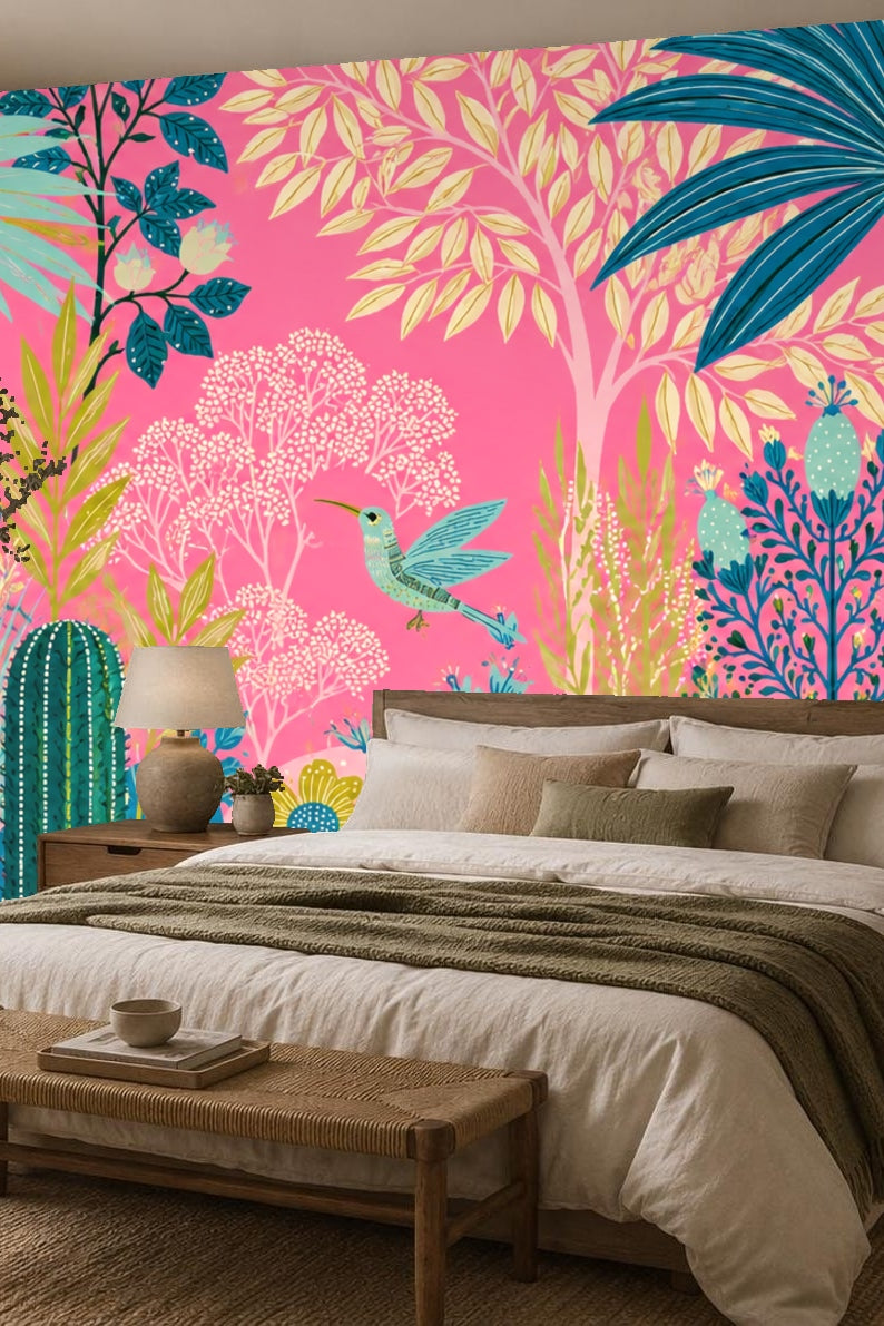 Tall palm leaves in blue and green amid pink floral wallpaper setting