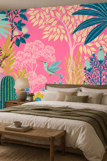 Tall palm leaves in blue and green amid pink floral wallpaper setting