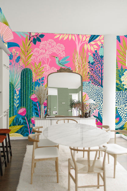 Blue and green detailed leaves and wildflowers on pink tropical wallpaper